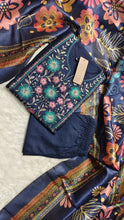Dark blue worked embroidery